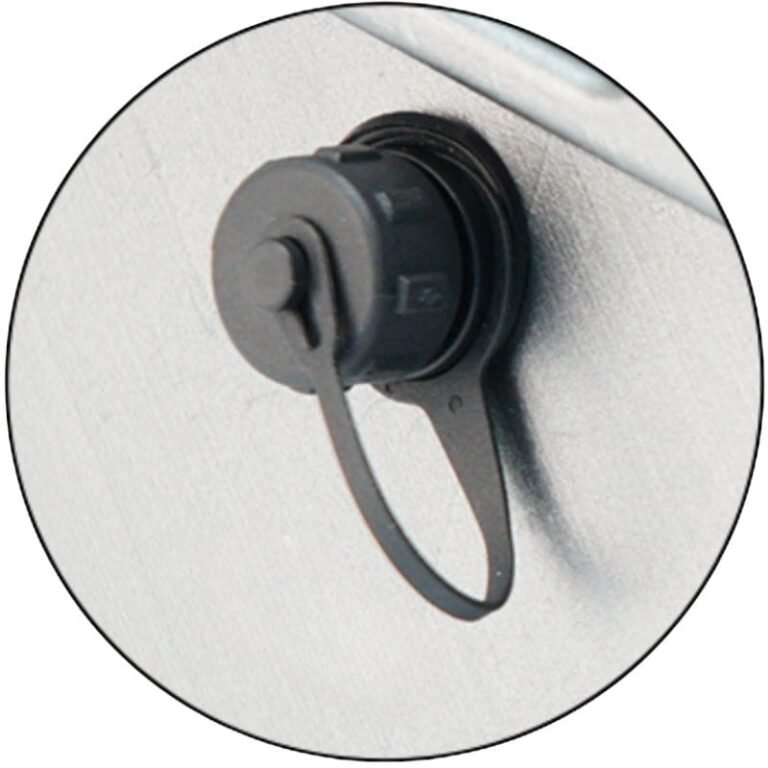 Close-up of the battery charging port with its protective cover